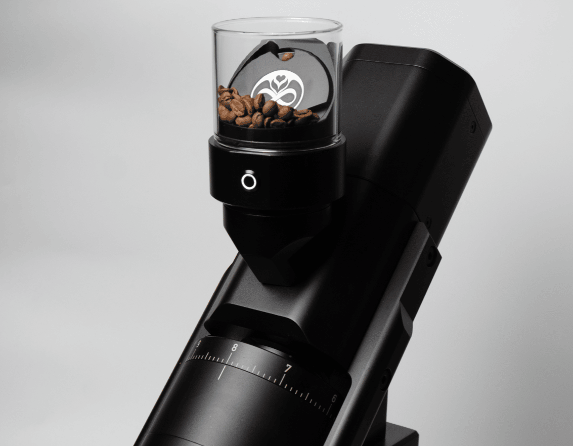 Slow Feeder Metal mounted on a single dose grinder, the setup used at the 2026 World Brewers Cup