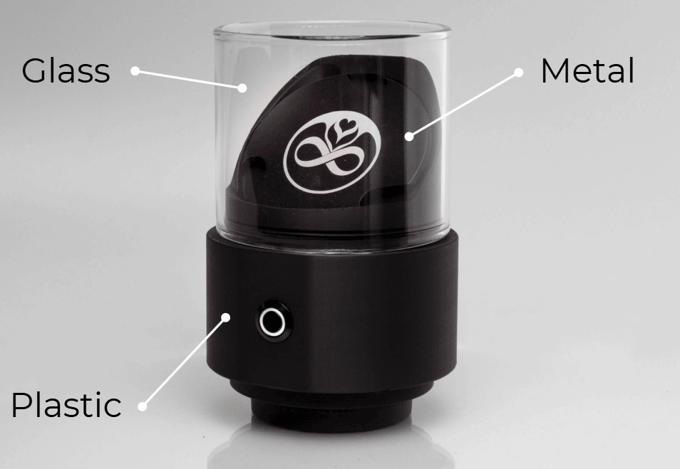 Slow Feeder Ultra materials: glass bean container, metal feeder disc, plastic housing